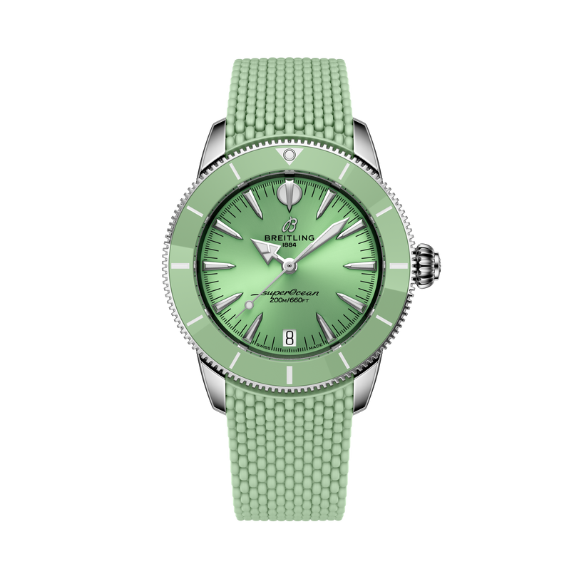 A Breitling Superocean Heritage Automatic 36 wristwatch with a green dial, textured strap, and silver accents, shown on a black background.